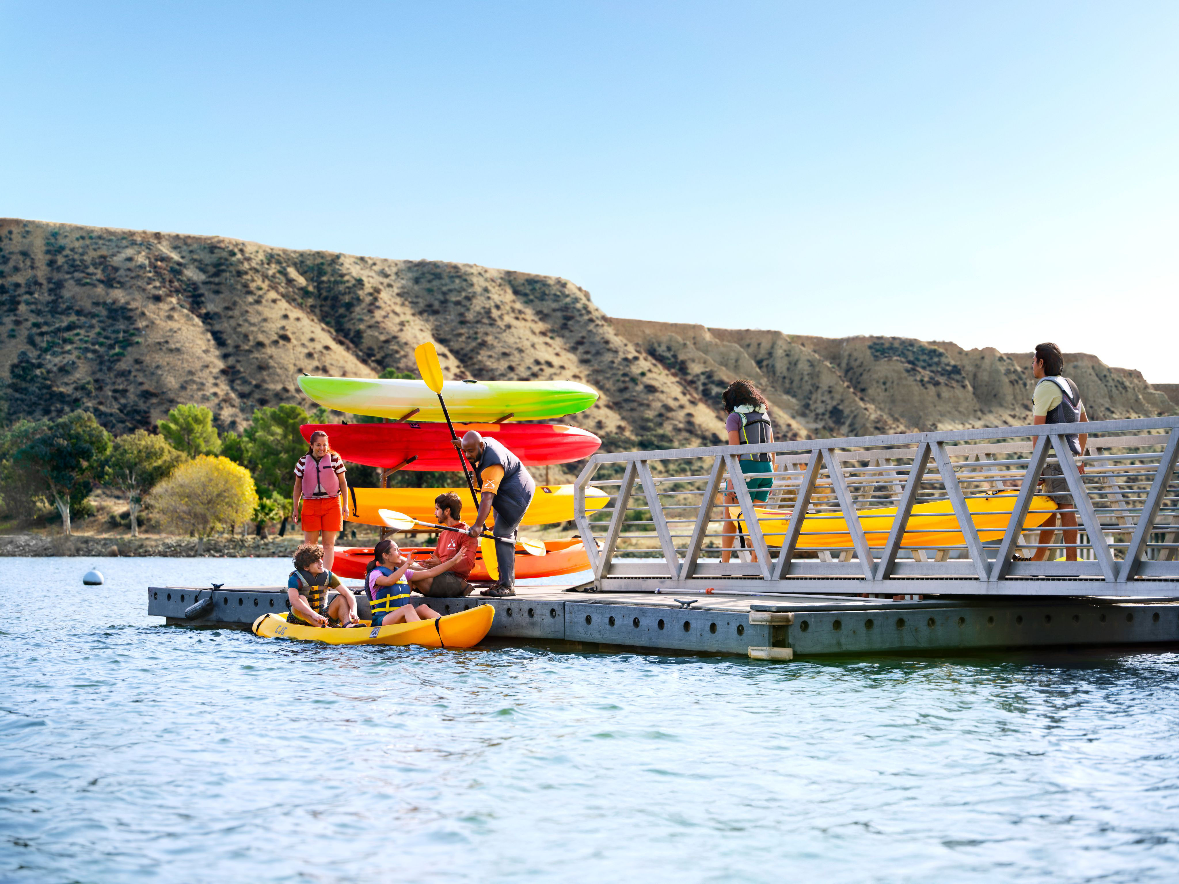 Family going out on the water in a Kayak